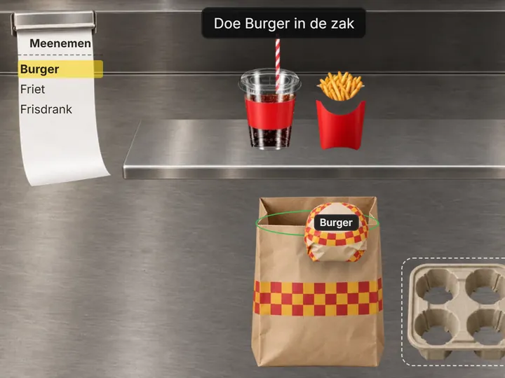 Wrapped burger going into a paper takeaway bag beside a drink carrier