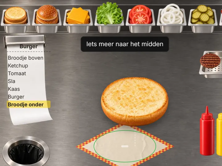 Burger bun being placed on wrapping paper below a rail of ingredient pans and an order ticket