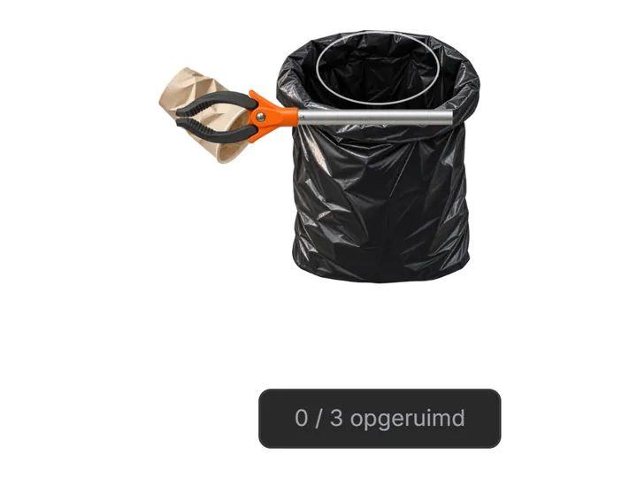 Litter picker carrying a crumpled cup toward an open black rubbish sack