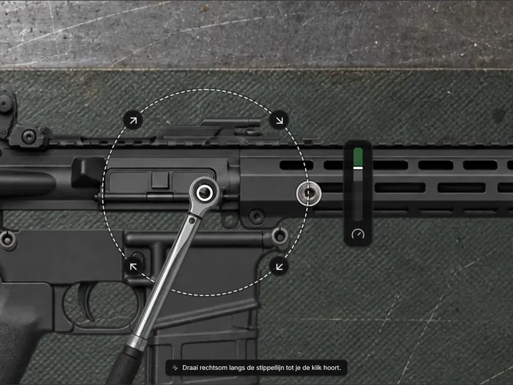 Torque wrench on a handguard screw of a rifle with a dashed turning circle and torque meter