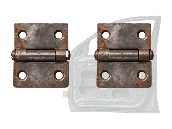 Two rusty door hinges against a car door frame, a marker on the first seam