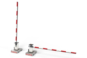 Two mobile barriers on galvanised ballast frames with red and white chevron plates: one with its 5 m red and white arm raised almost upright, one with the arm lowered across the lane