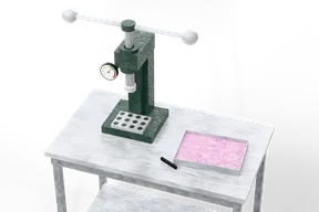 A green cast spindle press with a pressure gauge and a long lever arm with ball ends, standing on a stainless table beside a die plate with twelve holes and a tray of pink powder with a scraper